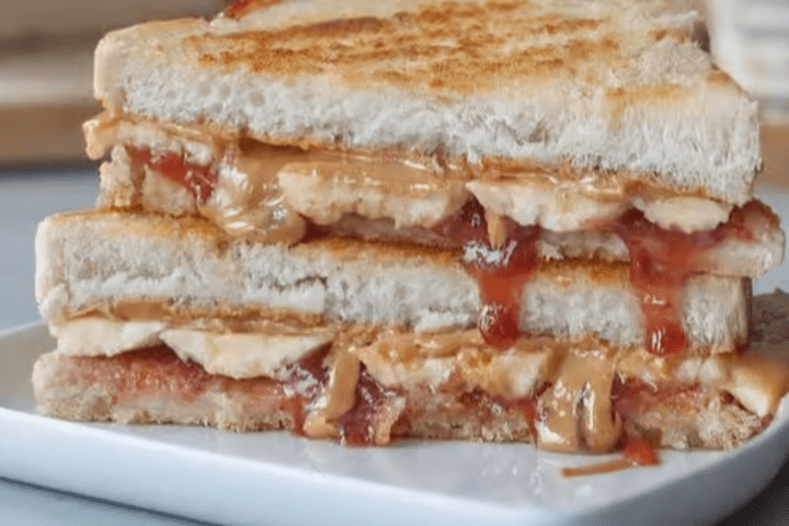 PB, strawberry jam and banana sandwich